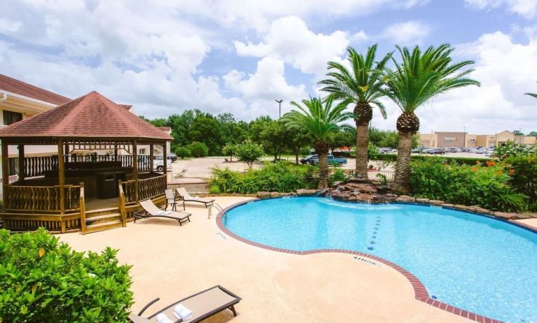 Refreshing outdoor pool at Best Western Pearland Inn.