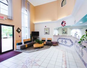 Lobby and coworking lounge at Best Western Pearland Inn.