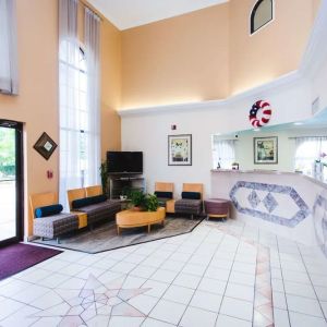 Lobby and coworking lounge at Best Western Pearland Inn.