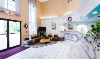 Lobby and coworking lounge at Best Western Pearland Inn.