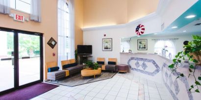 Lobby and coworking lounge at Best Western Pearland Inn.