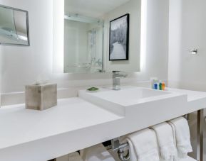 Guest bathroom with shower at Radisson Hotel Sunnyvale Silicon Valley.