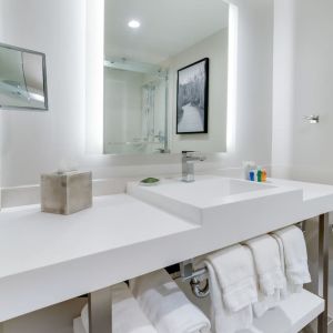 Guest bathroom with shower at Radisson Hotel Sunnyvale Silicon Valley.