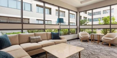 Lobby and coworking lounge at Radisson Hotel Sunnyvale Silicon Valley.