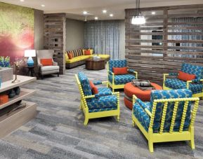 Lobby and coworking lounge at Courtyard By Marriott Fort Worth Historic Stockyards.