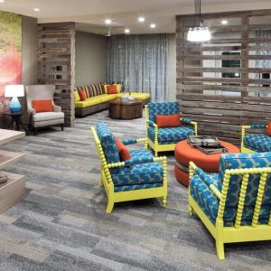 Lobby and coworking lounge at Courtyard By Marriott Fort Worth Historic Stockyards.