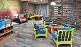 Lobby and coworking lounge at Courtyard By Marriott Fort Worth Historic Stockyards.