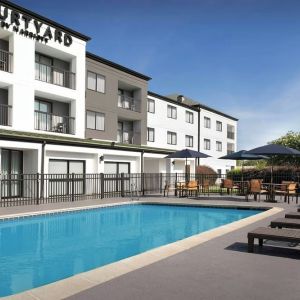 Refreshing outdoor pool at Courtyard By Marriott Hattiesburg.