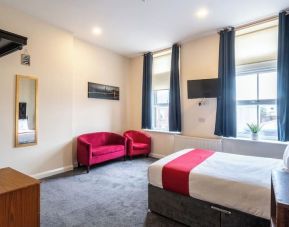 Bright and spacious day use room with  lounge seating at Trivelles Seaforth Hotel.