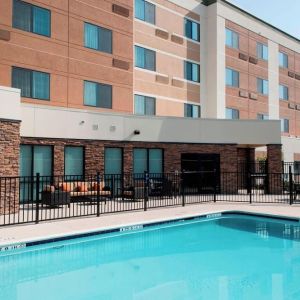 Refreshing outdoor pool at Courtyard By Marriott Houston NASA/Clear Lake.