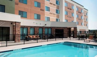 Refreshing outdoor pool at Courtyard By Marriott Houston NASA/Clear Lake.