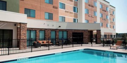 Refreshing outdoor pool at Courtyard By Marriott Houston NASA/Clear Lake.