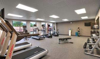 Fitness center available at Courtyard By Marriott Houston NASA/Clear Lake.