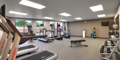 Fitness center available at Courtyard By Marriott Houston NASA/Clear Lake.