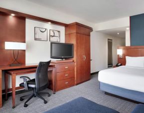 Day use room with work desk and sofa at Courtyard By Marriott Houston NASA/Clear Lake.