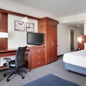 Day use room with work desk and sofa at Courtyard By Marriott Houston NASA/Clear Lake.