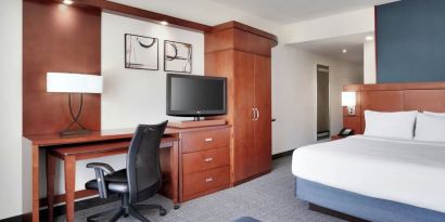 Day use room with work desk and sofa at Courtyard By Marriott Houston NASA/Clear Lake.