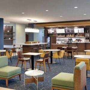 Dining area perfect for coworking at Courtyard By Marriott Houston NASA/Clear Lake.