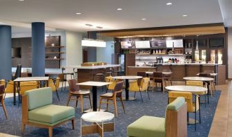 Dining area perfect for coworking at Courtyard By Marriott Houston NASA/Clear Lake.