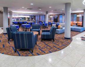 Lobby and coworking lounge at Courtyard By Marriott Montgomery Prattville.