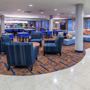 Lobby and coworking lounge at Courtyard By Marriott Montgomery Prattville.