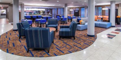 Lobby and coworking lounge at Courtyard By Marriott Montgomery Prattville.