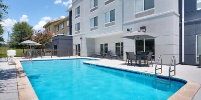 Refreshing outdoor pool at Fairfield Inn & Suites By Marriott Albany.