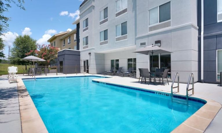 Refreshing outdoor pool at Fairfield Inn & Suites By Marriott Albany.