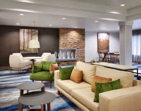 Lobby and coworking lounge at Fairfield Inn & Suites By Marriott Albany.