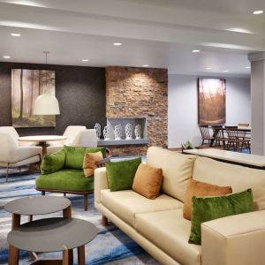 Lobby and coworking lounge at Fairfield Inn & Suites By Marriott Albany.