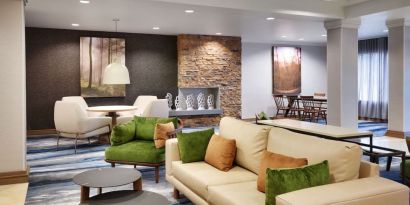 Lobby and coworking lounge at Fairfield Inn & Suites By Marriott Albany.