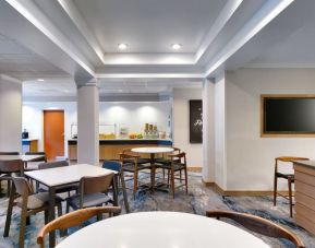 Dining area perfect for coworking at Fairfield Inn & Suites By Marriott Albany.