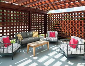 Outdoor furniture perfect for coworking at Fairfield Inn & Suites By Marriott Houston Pasadena.