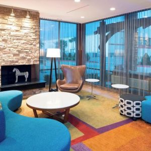 Lobby and coworking lounge at Fairfield Inn & Suites By Marriott Houston Pasadena.