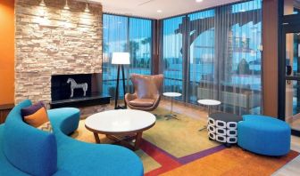 Lobby and coworking lounge at Fairfield Inn & Suites By Marriott Houston Pasadena.