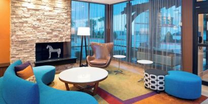 Lobby and coworking lounge at Fairfield Inn & Suites By Marriott Houston Pasadena.