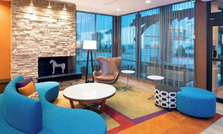 Lobby and coworking lounge at Fairfield Inn & Suites By Marriott Houston Pasadena.