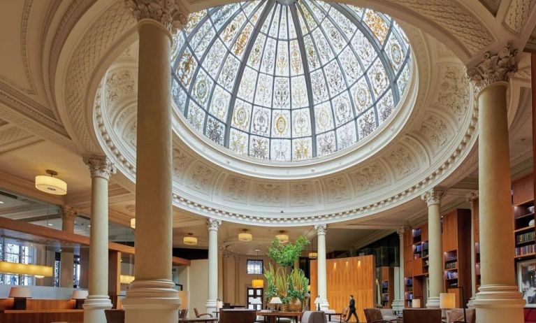 Beautiful lobby with lounge area and workspace at Threadneedles, Marriott Autograph Collection Hotel.