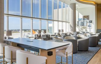 Ample seats with natural light perfect for coworking at Plaza Premium Lounge. Terminal C (MCO).