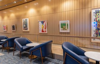 Seats available in front of the Orlando Storytelling Wall at Plaza Premium Lounge. Terminal C (MCO).