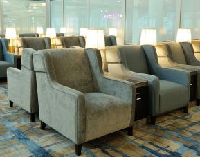 Ample seats with natural light perfect for coworking at Plaza Premium Lounge. Terminal 1 (YYZ).
