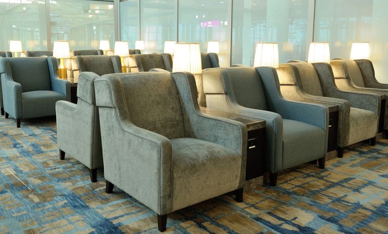 Ample seats with natural light perfect for coworking at Plaza Premium Lounge. Terminal 1 (YYZ).
