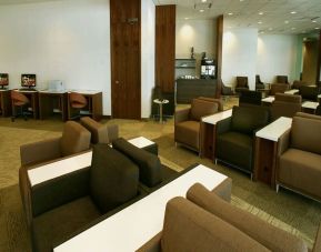 Ample seats and business center available perfect for coworking at Plaza Premium Lounge - Terminal 1 (YYZ).