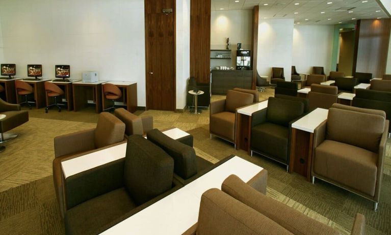 Ample seats and business center available perfect for coworking at Plaza Premium Lounge - Terminal 1 (YYZ).