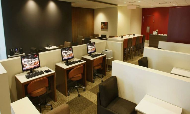 Ample seats and business center available perfect for coworking at Plaza Premium Lounge - Terminal 1 (YYZ).