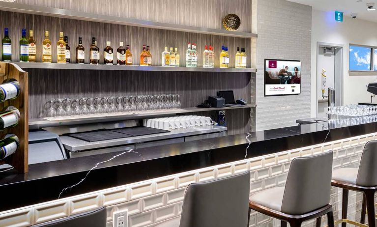 Bar with alcoholic drinks and cocktails available at Plaza Premium Lounge - Terminal 1 (YYZ).