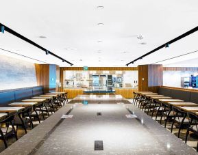 Expansive dining area perfect for coworking at Plaza Premium Lounge - Terminal 3 (YYZ).