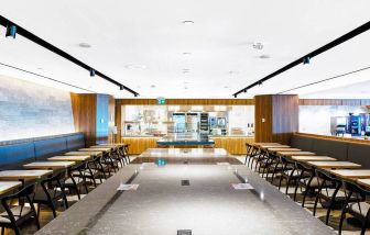 Expansive dining area perfect for coworking at Plaza Premium Lounge - Terminal 3 (YYZ).