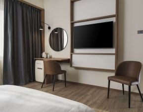 Day room with TV at Hilton Garden Inn Padova City Centre.