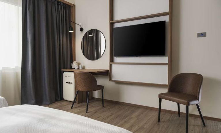 Day room with TV at Hilton Garden Inn Padova City Centre.